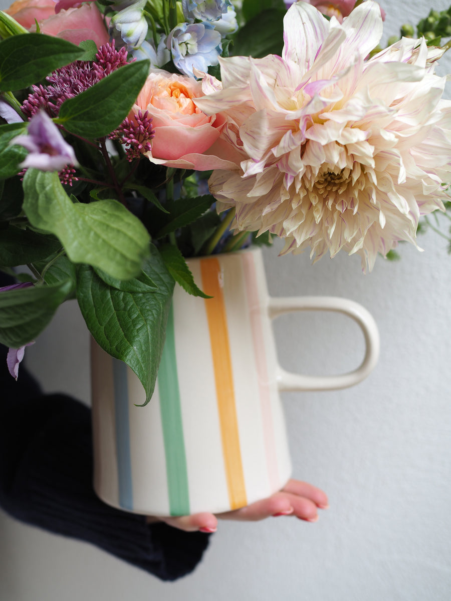Caroline Gardener Stripe Jug Filled With Seasonal Flowers