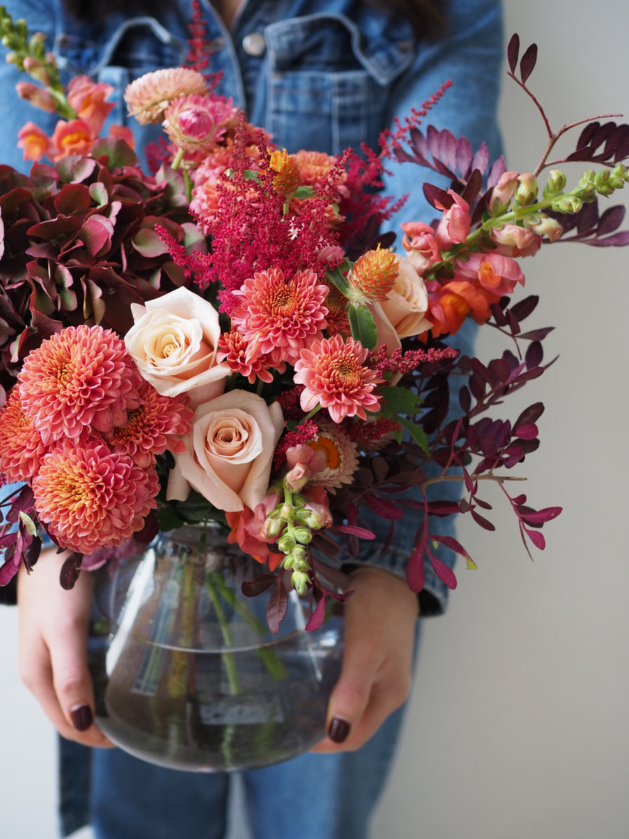 Small Seasonal Vase Full Of Flowers