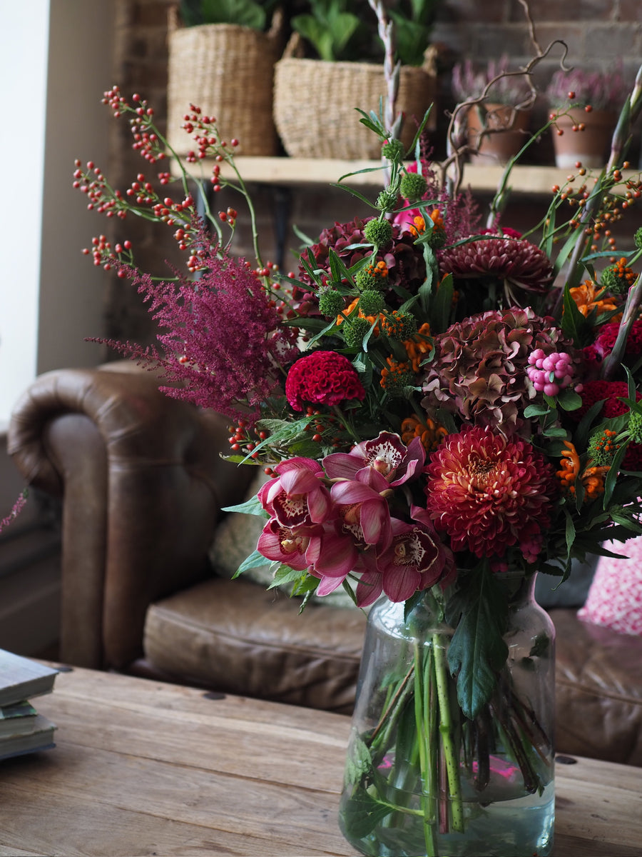 Rich And Flamboyant Seasonal Vase Full Of Flowers
