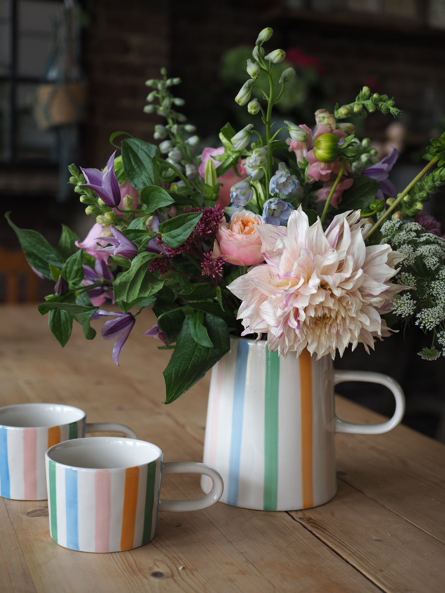 Caroline Gardener Stripe Jug Filled With Seasonal Flowers