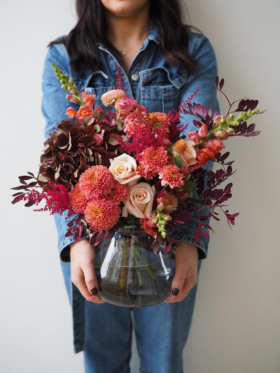 Small Seasonal Vase Full Of Flowers