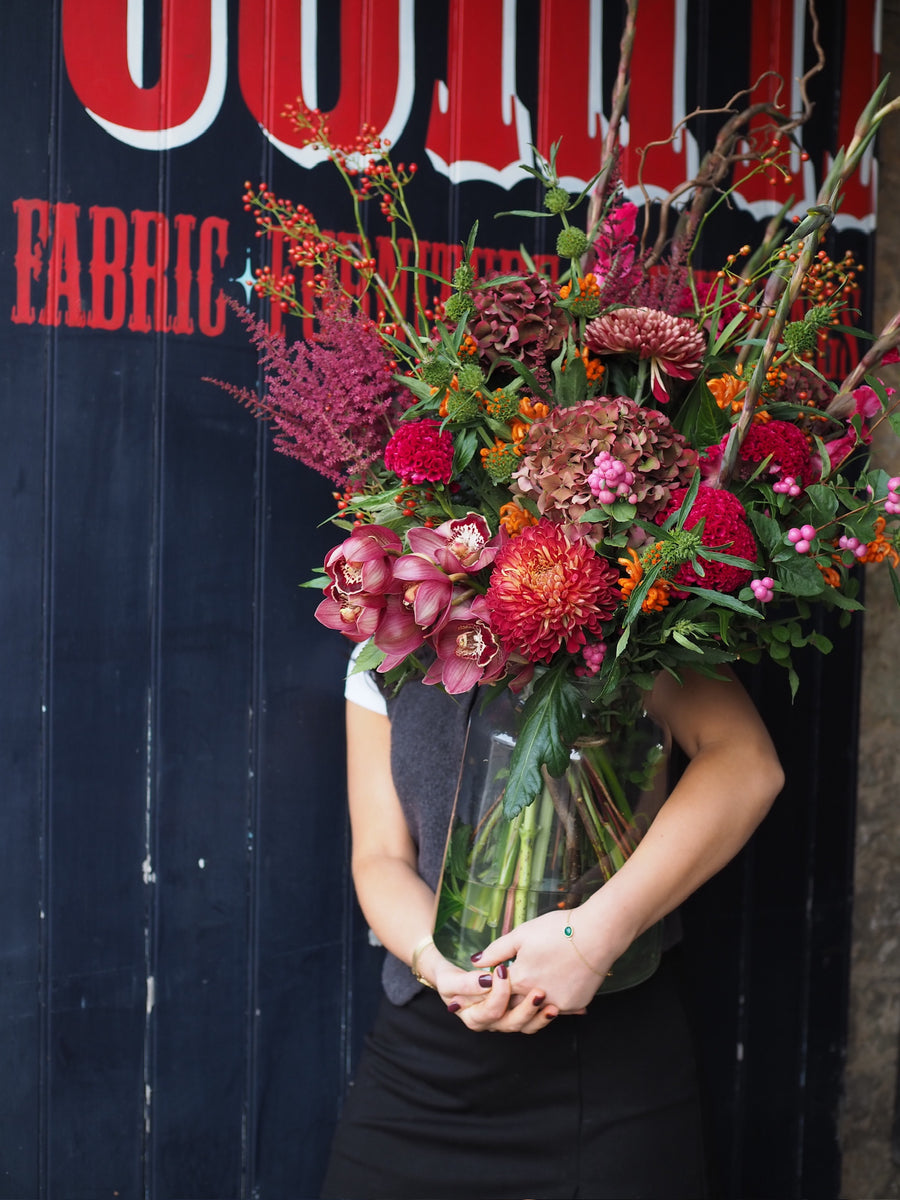Rich And Flamboyant Seasonal Vase Full Of Flowers