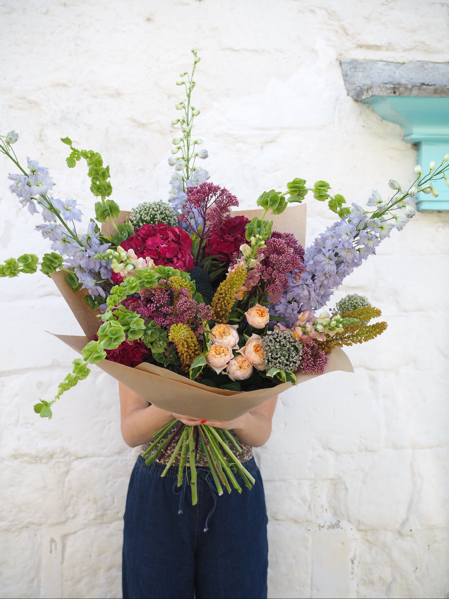 Rich And Flamboyant Seasonal Vase Full Of Flowers